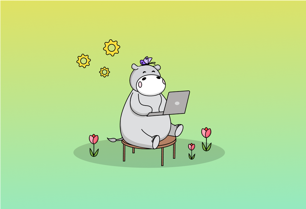 Hippo sitting on a table using a laptop, surrounded by cute little flowers